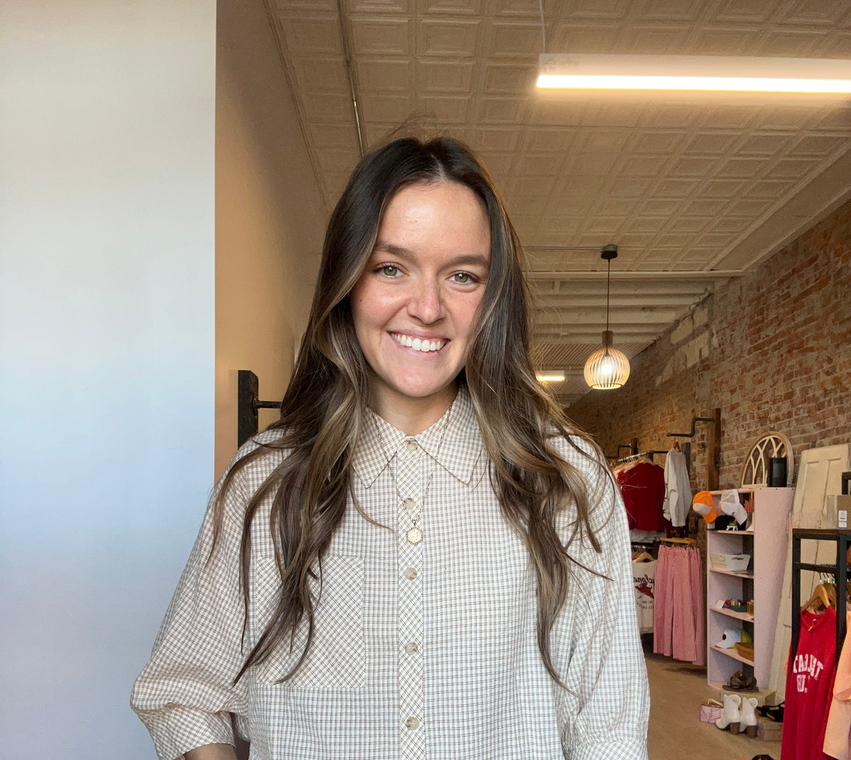 Mila Gingham Ruffle Hem Shirt-apparel-in february-The Funky Zebra Ames, Women's Fashion Boutique in Ames, Iowa