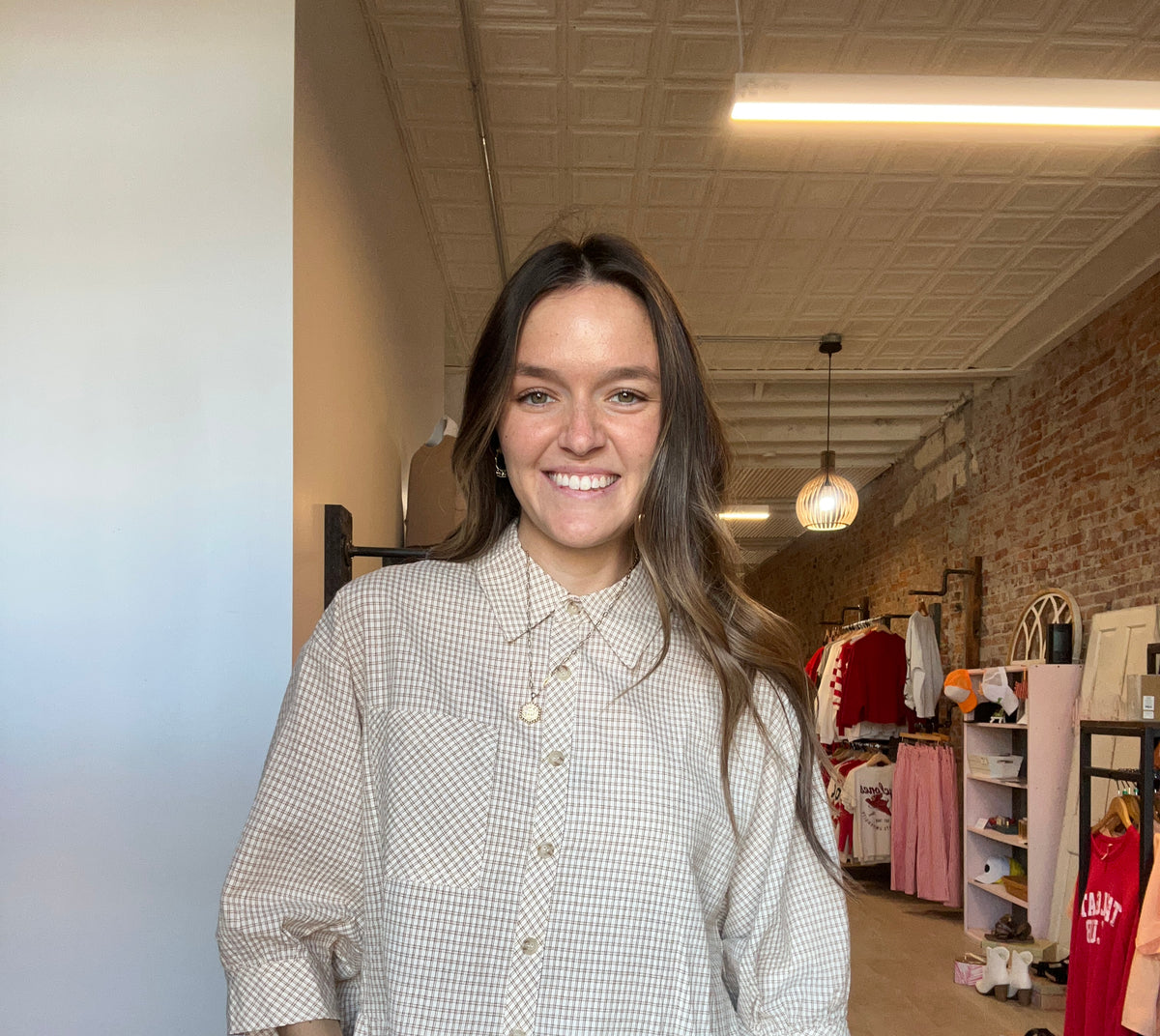 Mila Gingham Ruffle Hem Shirt-apparel-in february-The Funky Zebra Ames, Women's Fashion Boutique in Ames, Iowa