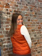 Storm Creek Pacific Orange Puffer-Vests-Storm Creek-The Funky Zebra Ames, Women's Fashion Boutique in Ames, Iowa