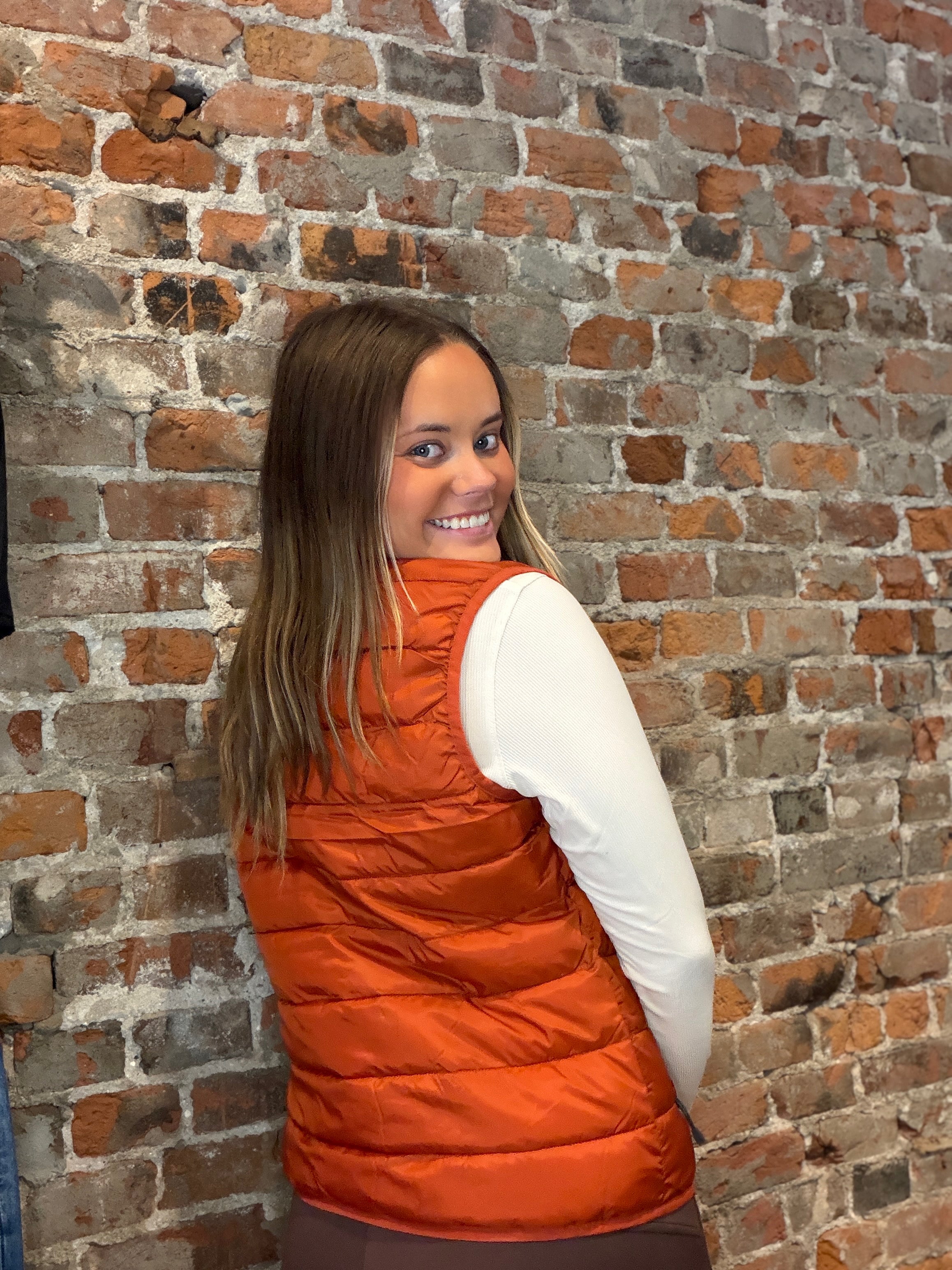 Storm Creek Pacific Orange Puffer-Vests-Storm Creek-The Funky Zebra Ames, Women's Fashion Boutique in Ames, Iowa