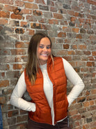 Storm Creek Pacific Orange Puffer-Vests-Storm Creek-The Funky Zebra Ames, Women's Fashion Boutique in Ames, Iowa